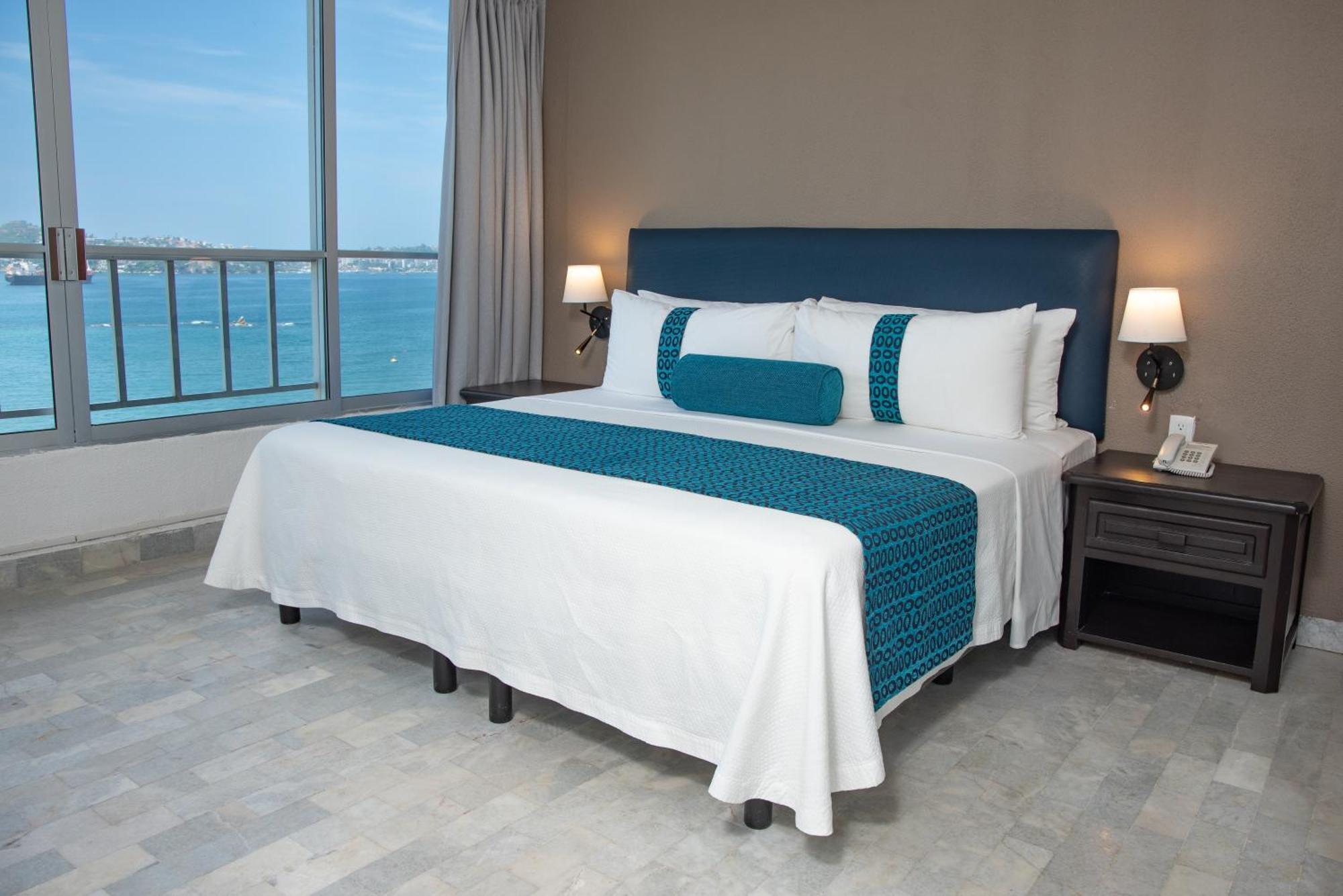 Ritz Acapulco All Inclusive Exterior photo A bed with a bed runner